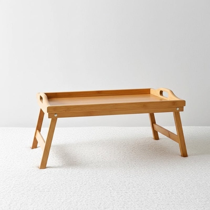 عام صينية سرير من خشب البامبو قابلة للطي متعددة الاستخدامات مناسبة لتقديم الإفطار أو القهوة أو استخدامها كطاولة لابتوب

تصميم عصري وعملي مزودة بأرجل قابلة للطي لتوفير المساحة وسهولة التخزين

مصنوعة من خشب بامبو عالي الجودة ومتين للاستخدام اليومي في المنزل أو على السرير أو في الحديقة بلون خشبي طبيعي أنيق - Image 2